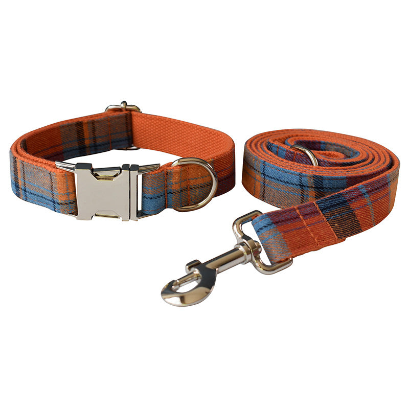 Plaid dog collar and leash set on a white background