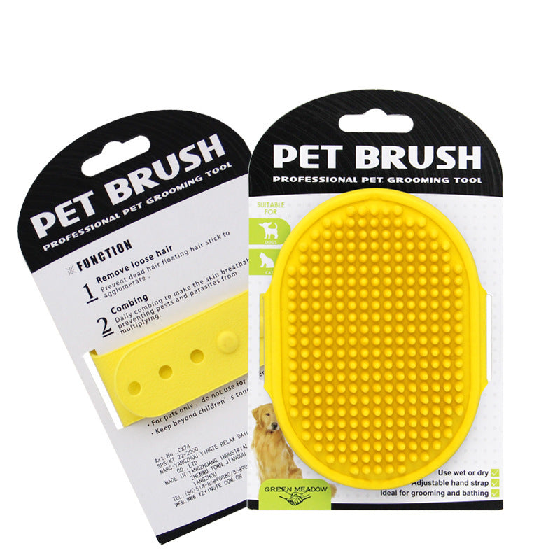 Yellow pet brush with packaging on a white background