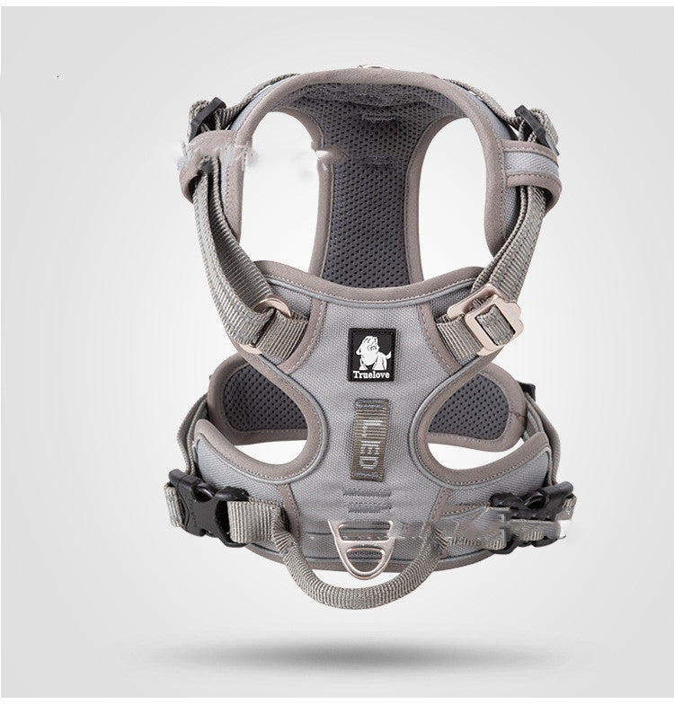 Gray dog harness with  brand logo on a white background