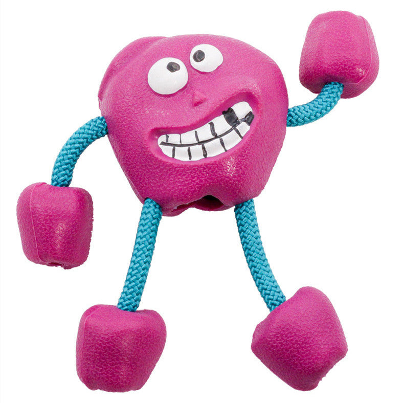 Pink dog toy with a face and blue strings on a white background