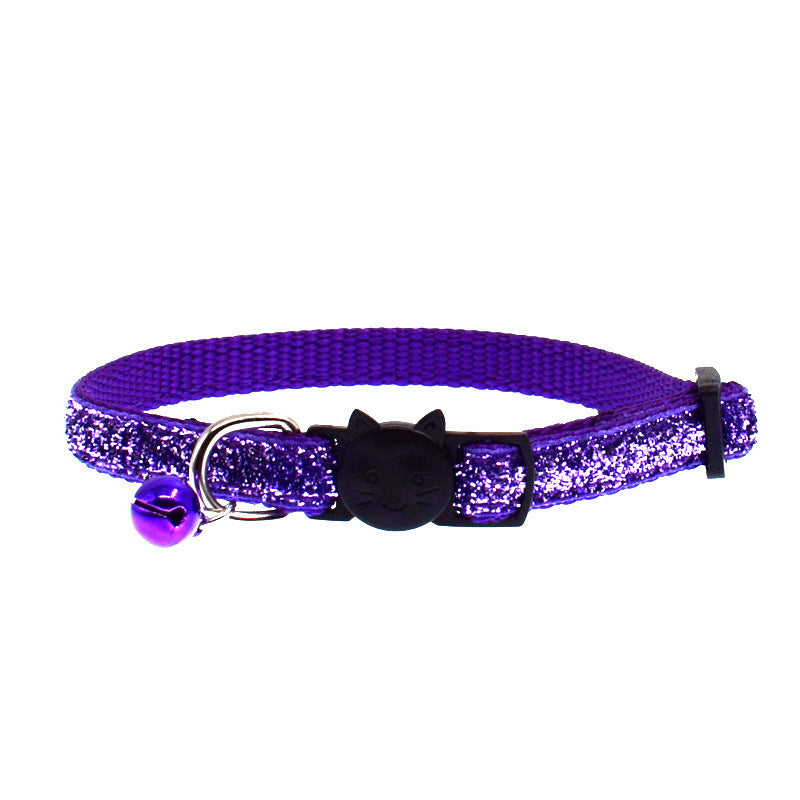 Purple glitter cat collar with a bell on a white background