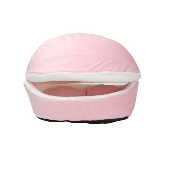 CAT Pink pet bed with a white interior on a white background