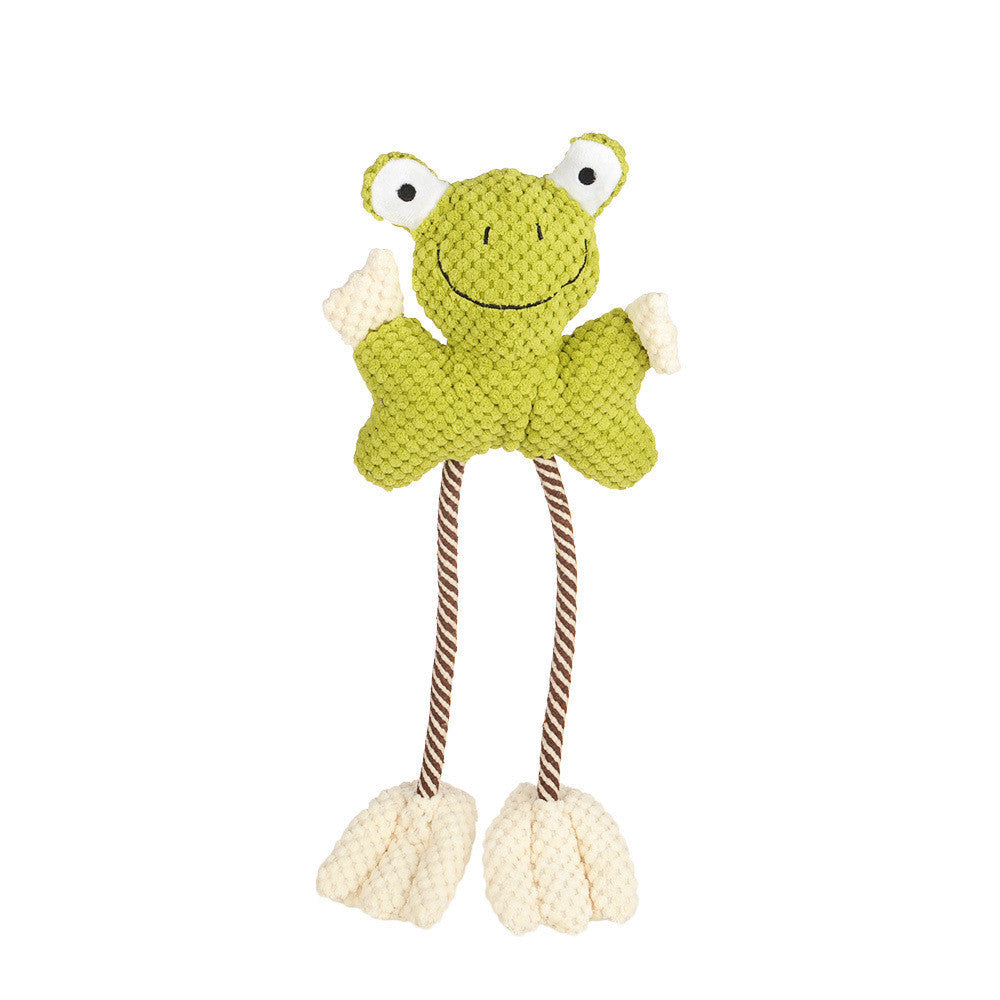 dog toy Green frog-shaped toy with white accents and brown legs, displayed 