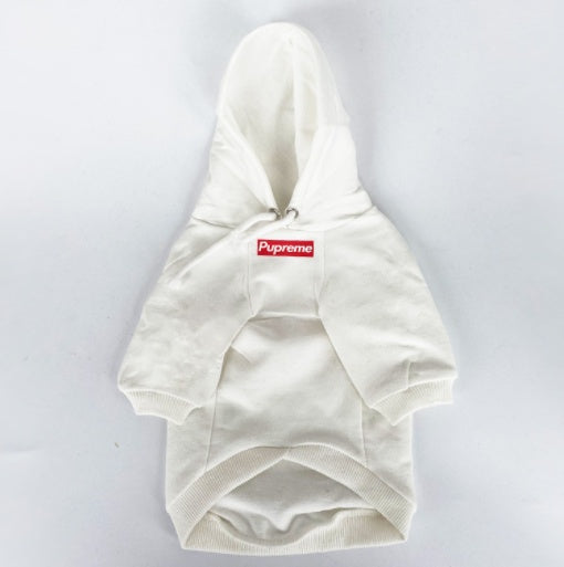 White dog hoodie with a red logo on a light gray background