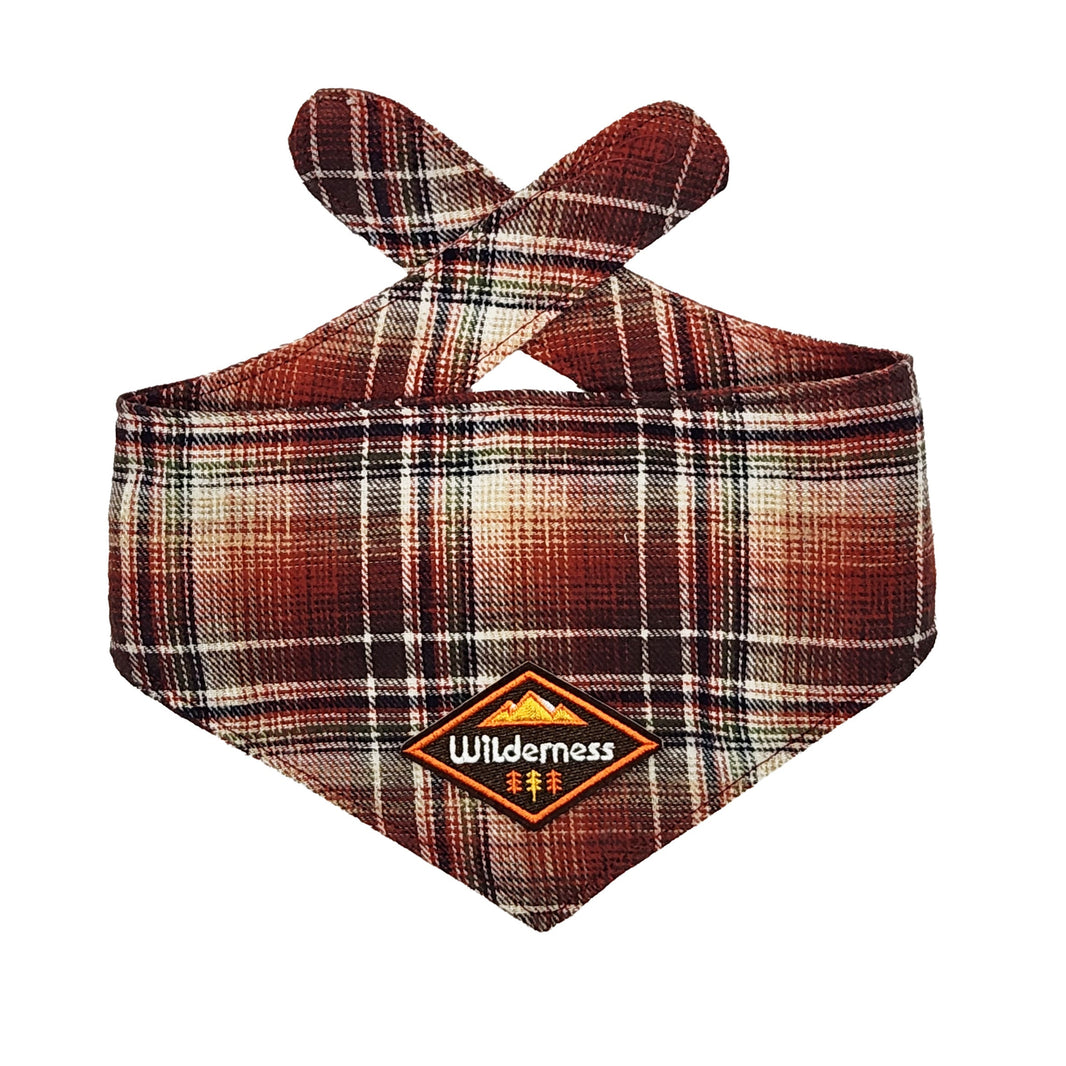 Plaid bandana with a 'Wilderness' logo on a white background