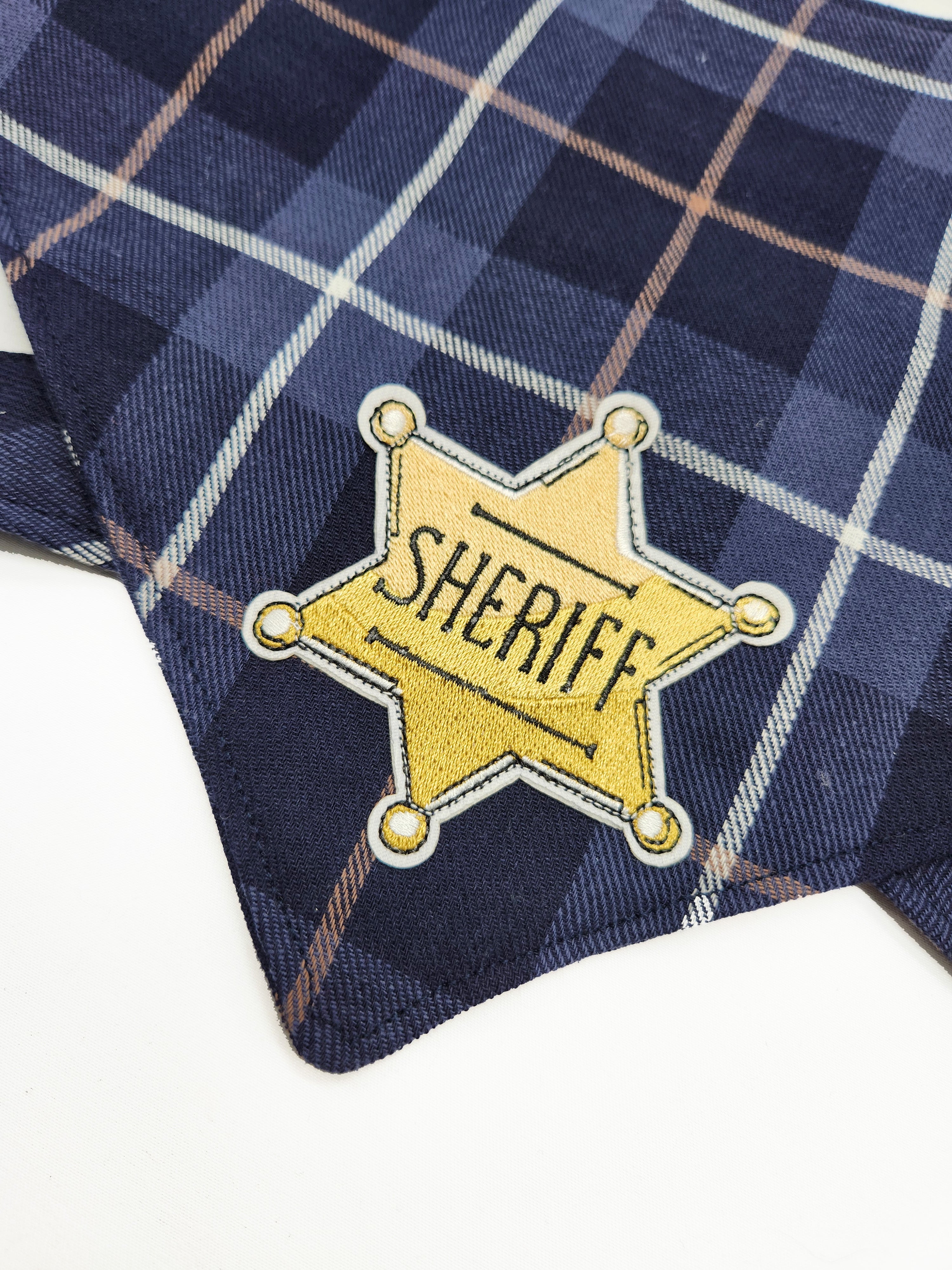 dOG Navy plaid fabric with a gold sheriff star patch