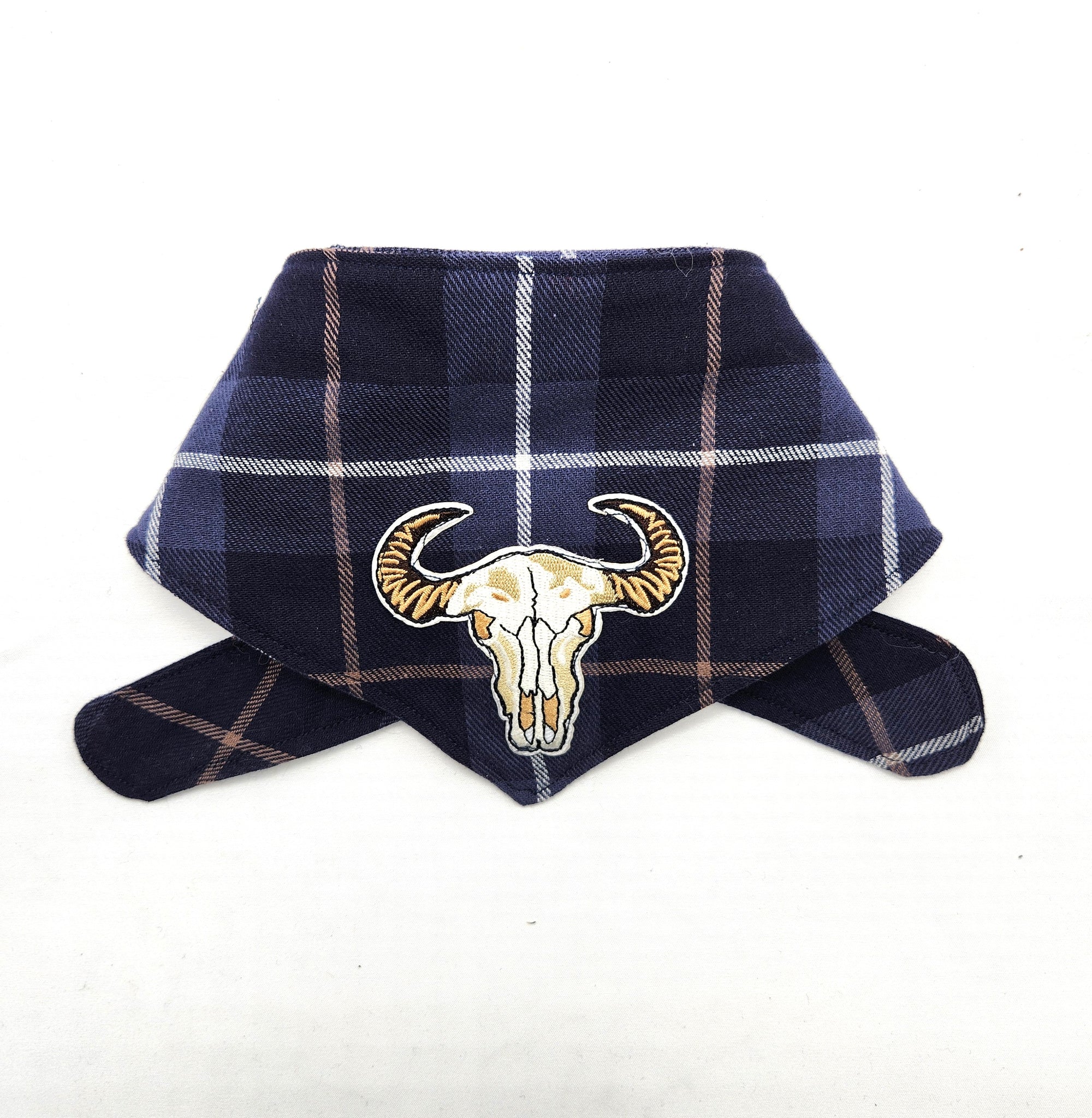 Navy plaid bandana with bull skull design on a white background