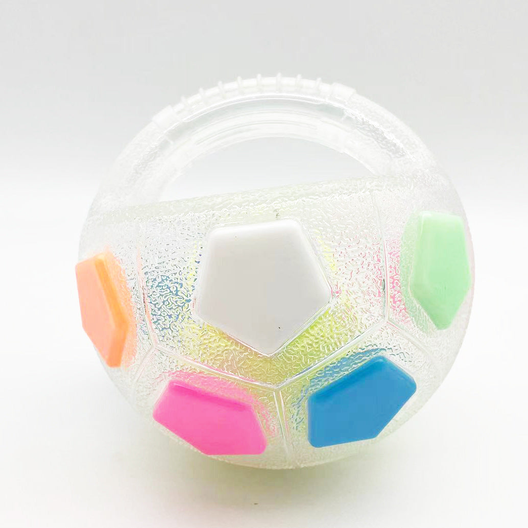 Clear colorufl rubber soccer ball.  colorful patches, with tennis ball inside