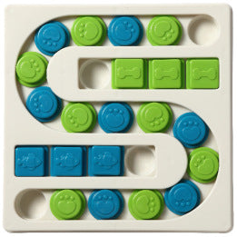 Colorful puzzle toy with blue and green interlocking pieces on a white base