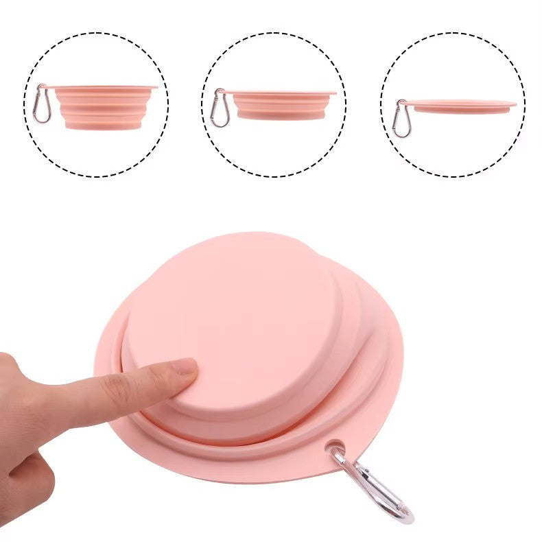 Pink collapsible bowl with a hand pressing it and close-up details on a white background