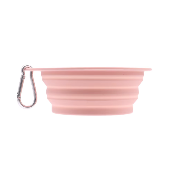 Pink collapsible bowl with a carabiner on a white background