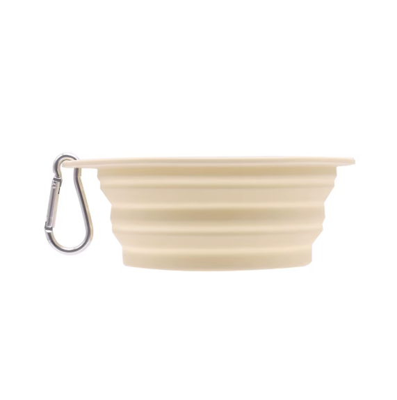 Beige silicone folding bowl with a carabiner on a white background